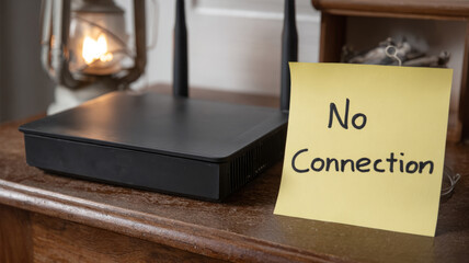 Router with 'No Connection' note on sticky paper.