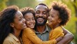 © Viktor - Happy Black family portrait shows father, mother, two kids embracing outdoor. Diverse parents, children express joy, togetherness, multicultural unity. Love, acceptance, harmony fill warm community