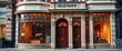 Elegant Georgian storefront with large display windows, ornate detailing, and a classic wooden door,  stylish,  charming