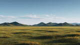 Vast grassy plains stretch towards a line of low mountains under a partly cloudy sky.