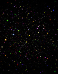 Wall Mural - Vibrant Array of Sparkling Stars and Colorful Glitter Against a Black Background