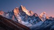 © Vee - Majestic mountain peak at sunrise.  A breathtaking panorama of a snow-capped mountain range at dawn.