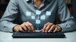 © Ben - A person types on a keyboard, with holographic connected folders above.