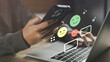 © The KonG - Sentiment analysis and opinion mining concept with emoji faces and digital feedback icons on a laptop and smartphone, representing customer emotions, online review analysis, User experience insights.