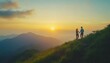 © Studicon - A man and a woman stand on a grassy mountain peak, holding hands and gazing at a vibrant sunrise over a range of misty mountains.