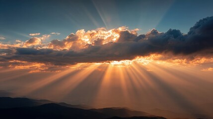 Wall Mural - Golden rays of sunlight break through clouds at sunset, casting dramatic shadows across a serene mountain landscape. The warm colors create a breathtaking view.