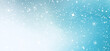 © Fitrotul - Delicate snowflakes and scattered white specks cascade across a soothing gradient backdrop transitioning from light blue to a deeper turquoise, creating a serene wintery ambiance