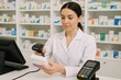 © Anastasiia - Pharmacist checking medication with barcode scanner in a pharmacy filled with various health products during working hours