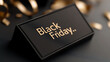 © photo for everything - Celebrate Black Friday. Stylish black box with gold lettering amidst festive ribbons. Special offers and great shopping opportunities await!