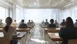 © Studicon - The illustration shows multiple students sitting at individual desks in a classroom setting, with their backs to the viewer, attentively facing a screen at the front of the room.