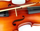 Close-up of a violin and bow