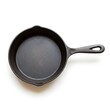 © Bangkit gultom - Black cast iron skillet on a white background