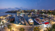 Aerial view of yacht harbor and red house roofs in Old town day to night timelapse Antalya, Turkey.