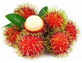 A captivating close-up of ripe red rambutan fruits, their spiky exteriors revealing juicy white flesh