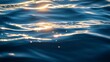 © Chaikit - detailed frame of serene water sheet, gentle waves undulating and scattered micro-splashes catching light reflections