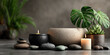 © Enrique - Minimal spa concept with stones, candles, and tropical leaves, soft lighting