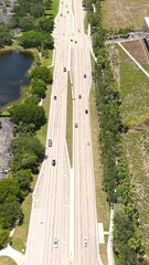 Wall Mural - Vertical Drone Shot of Avenue Traffic in Suburbs of Fort Lauderdale, Florida USA