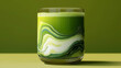 © AgungKY - Vibrant green matcha smoothie with creamy swirls in clear glass on green background