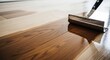 © Dece Std - Applying finish to a wood floor, half done, glossy & natural tone
