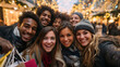 © Nathan - Joyous group of friends, diverse and smiling, enjoying a snowy festive day adorned with twinkling lights.