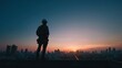 © Marcelino Victor M - Construction worker silhouette on rooftop at sunset, industry and city skyline
