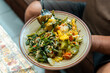© Ryan - Close-up of a traditional Indonesian healthy dish with fresh vegetables, corn, bean sprouts, and greens. Nutritious homemade food concept, perfect for diet, organic lifestyle, and local cuisine.