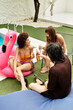 © Bliss - Stylish friends enjoying joyful moments together at a vibrant pool party under the sun