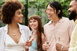 © Bliss - Young friends enjoy laughter and joy together at a vibrant outdoor cafe gathering during the day