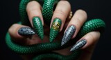 A hand adorned with vibrant green nail art and a snake wrapped around the fingers, showcasing intricate designs against a dark background