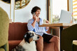 © Bliss - Joyful moments of a young man enjoying a cafe visit with his dog