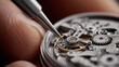 © Gulnaz - A person is working on a watch, carefully adjusting the gears