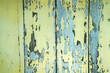 © sakhorn38 - Weathered Yellow and Blue Wooden Planks with Peeling Paint Texture