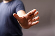 © vegefox.com - Close-up of a man's hand outstretched, palm open.  Perfect for concepts of help, hope,  reach, and connection.