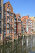 Vibrant buildings along the serene canals of Hamburg Hafencity showcase historic architecture
