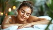 © Роксолана Гордієвич - Relaxing spa: a woman with her eyes closed on a massage table, covered in foam, useful for advertising spa services and relaxation.