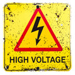 © Cici - An aged and corroded high voltage electrical warning sign featuring a bold lightning symbol, conveying a clear message of potential danger and hazard
