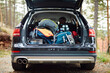 © Boris Jovanovic/Stocksy - Camping gear in the trunk of a car