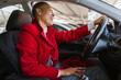 © Camelia Elisabeta Utalea/Stocksy - a woman maneuvering her car