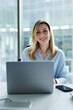 © Oleksii Syrotkin/Stocksy - Portrait of happy company CEO looking at camera during working