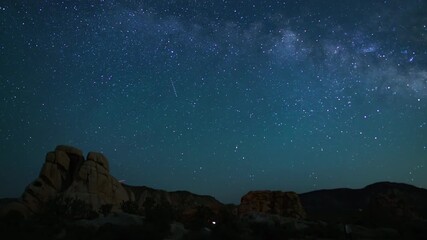 Wall Mural - Joshua Tree National Park Aurora Airglow and Milky Way Galaxy Over Hidden Valley 24mm Astrophotography Time Lapse California USA