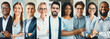© Prostock-studio - A diverse group of business professionals gathers in a modern office space. They share smiles and display confidence, reflecting teamwork and collaboration in their professional environment.