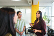 © Dani Nahuel/Stocksy - Young Leader Sharing Ideas with Diverse Team