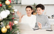 © JackF - Mother and son during video call on New Year holidays
