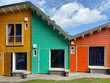 © Rene de Haan/Stocksy - colourful tiny houses