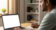 © l1gend - Over shoulder view of white blank empty mockup laptop screen for advertising. Indian adult male student having virtual meeting, training online call, educational webinar, chatting or working at home