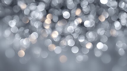 Wall Mural - dreamy silver bokeh background with large soft glowing light orbs white on grey festive defocused ab