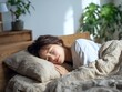 © Jumpei - リラックスした寝顔で安らかな睡眠をとる日本人女性の朝の風景
