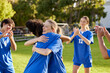 © Rido - Athlete girls hugging and celebrate after goal
