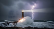 © jakkaphong - Lighthouse Guiding Through Stormy Seas