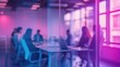 © Da - Blurred office meeting background with laptop on glass table, people sitting together in purple blue tones with bokeh lights and glass wall reflections creating professional workspace atmosphere.